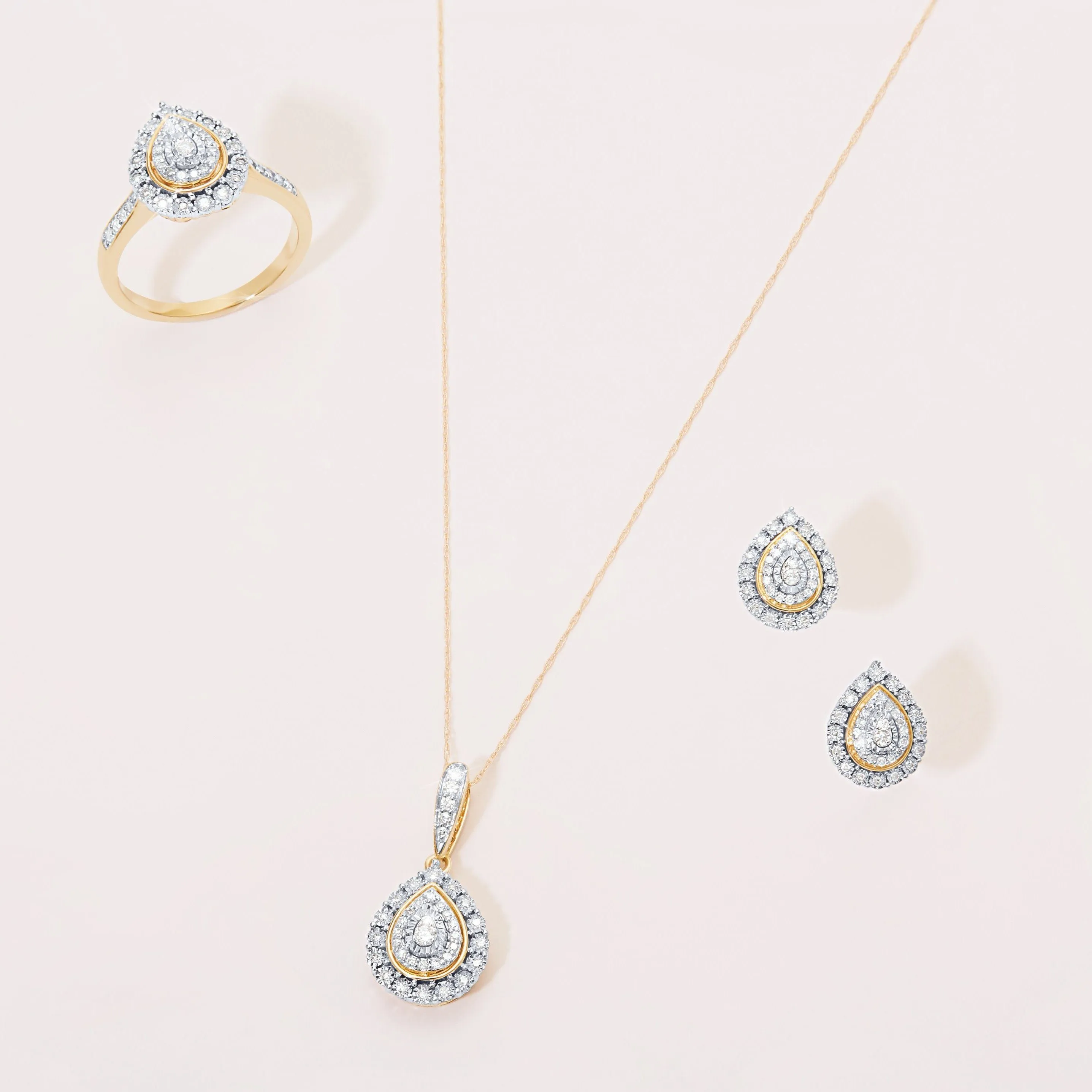 Miracle Pear Halo Earrings with 1/5ct of Diamonds in 9ct Yellow Gold