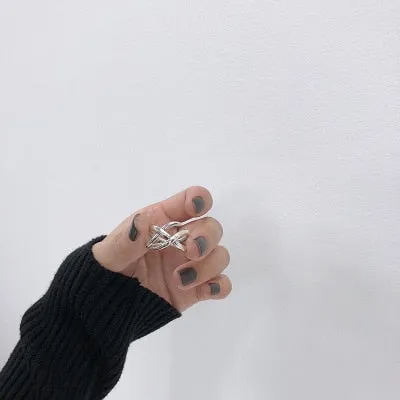 Smooth X-shaped Rings